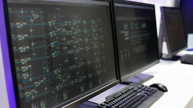 Two monitors with SCADA software on.