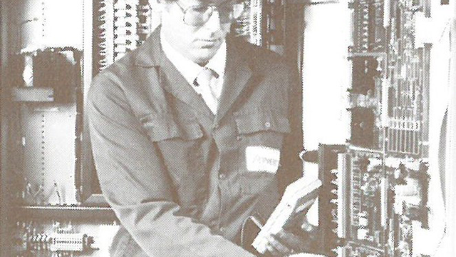 A photograph of an engineer in the 1980s.